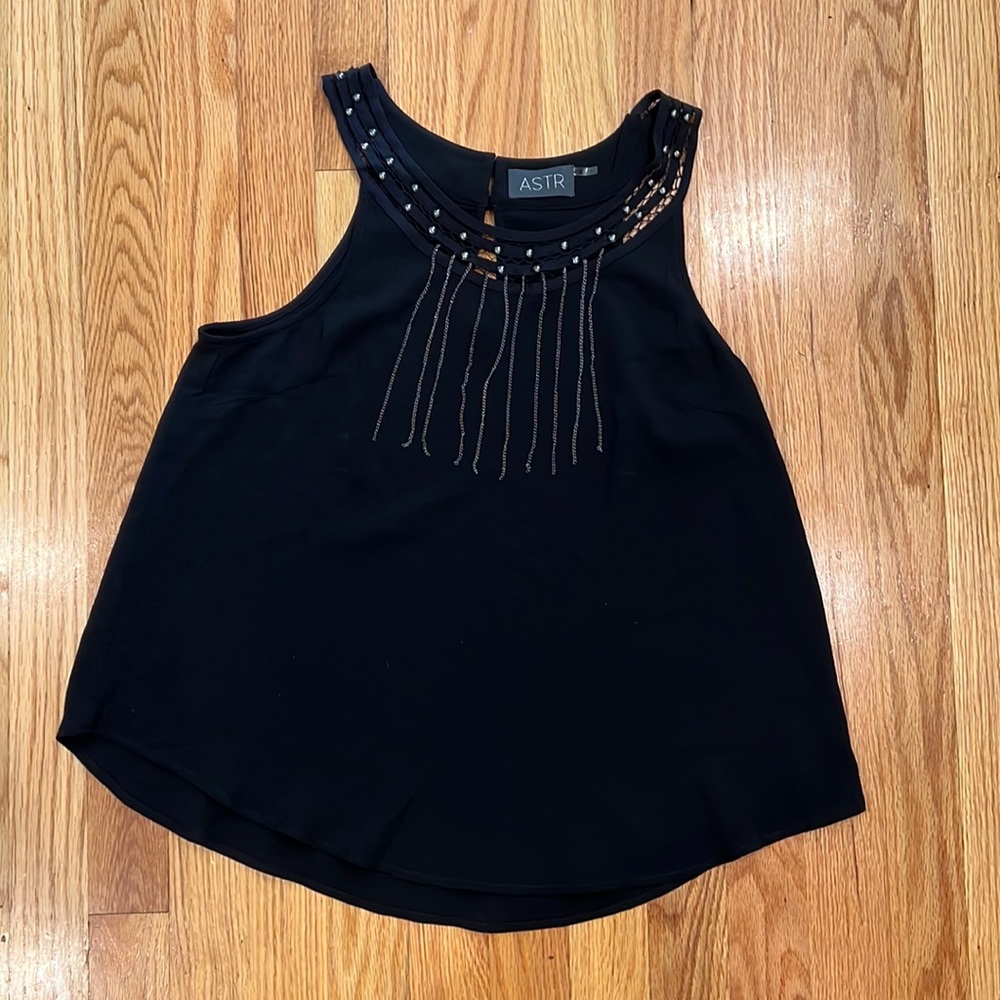 Black tank top with a little flare